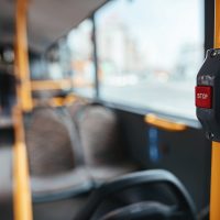 closeup-handle-empty-bus-during-global-coronavirus-epidemic-min